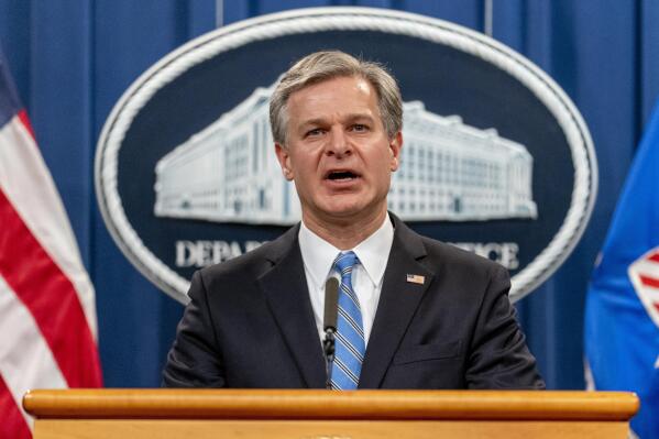 FILE - FBI Director Christopher Wray speaks at a news conference at the Justice Department in Washington, on Nov. 8, 2021. Wray says the threat to the West from the Chinese government is "more brazen" and damaging than ever before. In a speech on Jan. 31, 2022, at the Reagan Presidential Library in California, Wray accused Beijing of stealing American ideas and innovation and launching massive hacking operations. (AP Photo/Andrew Harnik, File)