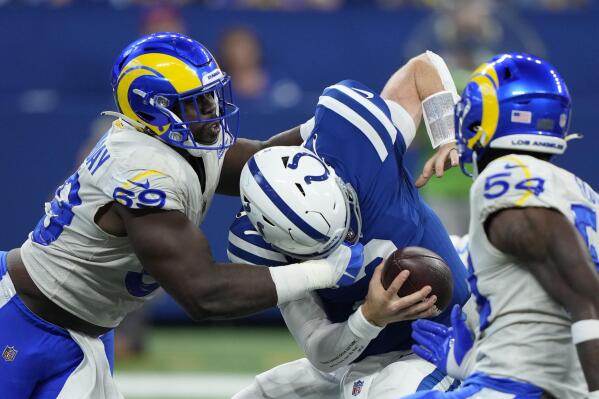 Stafford already boosting Rams over adversity, late deficits | AP News