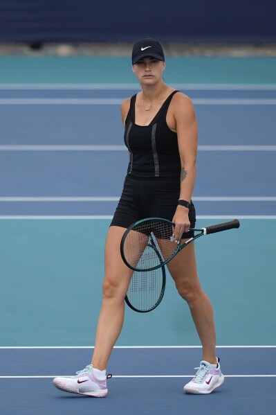 Aryna Sabalenka, of Belarus, walks on a practice court at the Miami Open tennis tournament, Wednesday, March 20, 2024, in Miami Gardens, Fla. (AP Photo/Rebecca Blackwell)