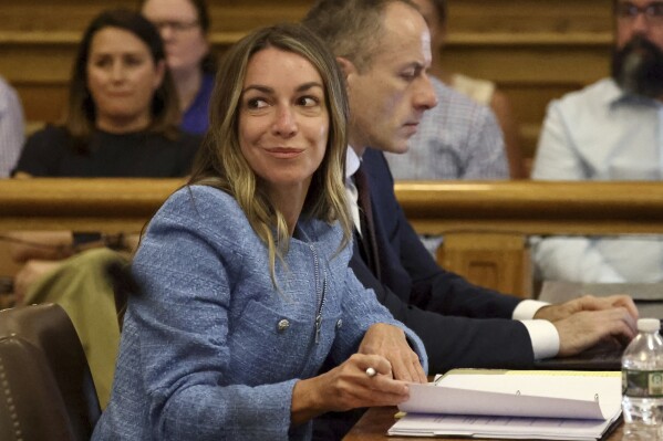 Karen Read smirks as her attorney cross examine Dr. Justin Rice during her murder trial at Norfolk Superior Court on Tuesday, May 28, 2024, in Dedham, Mass. (Stuart Cahill/The Boston Herald via AP, Pool)