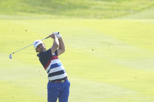 United States' Brooks Koepka plays a shot to the 1st green during a practice round ahead of the Ryder Cup at the Marco Simone Golf Club in Guidonia Montecelio, Italy, Wednesday, Sept. 27, 2023. The Ryder Cup starts Sept. 29, at the Marco Simone Golf Club. (AP Photo/Andrew Medichini)