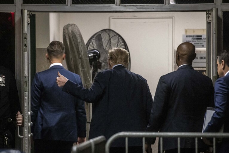 Former President Donald Trump gestures as he leaves the courtroom during a break in his trial Manhattan criminal court , Friday, April 26, 2024, in New York. (Dave Sanders/The New York Times via AP, Pool)