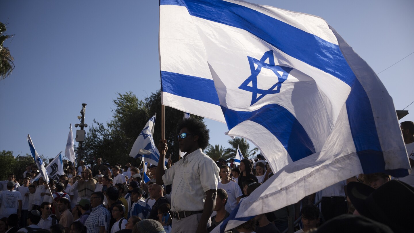 Israeli nationalists march through Palestinian area : Israel-Hamas war