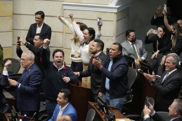Opposition senators celebrate after voting against a labor reform referendum proposed by the government, in Bogota, Colombia, Wednesday, May 14, 2025. (AP Photo/Fernando Vergara)