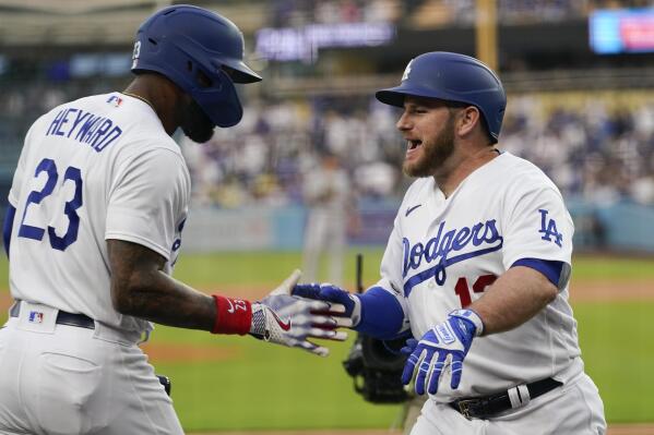 Dodgers win in 12th on bases-loaded walk, Muncy homers twice to