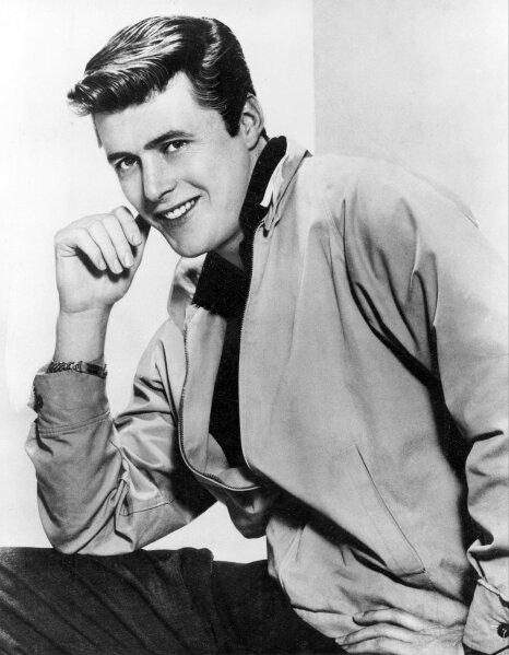FILE - This 1959 file photo shows Edward "Kookie" Byrnes. Edd Byrnes, who played cool-kid Kookie on the hit TV show “77 Sunset Strip,” scored a gold record with a song about his character’s hair-combing obsession and later appeared in the movie “Grease,” has died at age 87. Byrnes died Wednesday, Jan. 8, 2020, at his home in Santa Monica, Calif., his son, Logan Byrnes, said in a statement. (AP Photo, File)