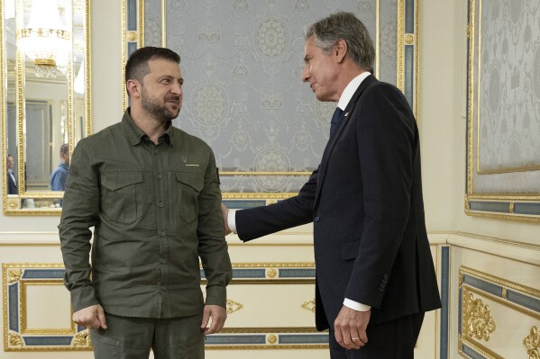 Ukraine's President Volodymyr Zelenskyy greets U.S. Secretary of State Antony Blinken before a meeting at Bankova in Kyiv, Ukraine, Wednesday, Sept. 6, 2023. (Brendan Smialowski/Pool via AP)