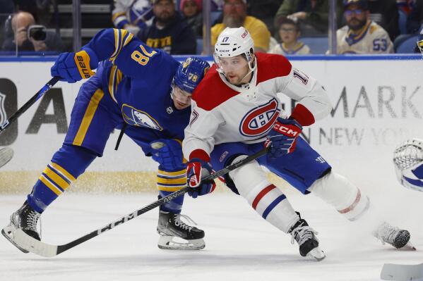 Buffalo Sabres defenseman Jacob Bryson (78) and Montreal Canadiens right wing Josh Anderson (17) battle for position during the second period of an NHL hockey game, Thursday, Oct. 27, 2022, in Buffalo, N.Y. (AP Photo/Jeffrey T. Barnes)