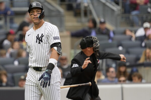 Homeplate umpire Ryan Blakney, right, ejects New York Yankees' Aaron Judge, left, from the game in the seventh inning of a baseball game against the Detroit Tigers, Saturday, May 4, 2024, in New York. (AP Photo/Mary Altaffer)