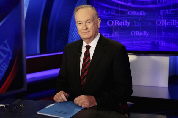 FILE - In this Thursday, Oct. 1, 2015, file photo host Bill O'Reilly of "The O'Reilly Factor" program, on the Fox News Channel, poses for photos, in New York. “The View” canceled a planned appearance Wednesday, July 21, 2021, by a woman who settled a sexual harassment lawsuit against O'Reilly, after the former Fox News Channel personality sought and received a restraining order against her. (AP Photo/Richard Drew, File)