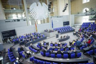 Lawmaker attend a meeting of the German federal parliament, Bundestag, in the Reichstag building in Berlin, Germany, Wednesday, May 10, 2023. Germany's three governing parties back the idea of appointing consultative bodies made up of members of the public selected through a lottery system who would discuss specific topics and provide non-binding feedback to legislators. (Kay Nietfeld/dpa via AP)
