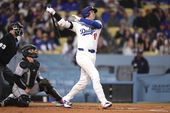 Shohei Ohtani away from the Los Angeles Dodgers for birth of his first child | AP News
