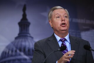 
              FILE - In this Nov. 1, 2017 file photo, Sen. Lindsey Graham, R-S.C., speaks on Capitol Hill in Washington.  Graham’s shift from Never Trump to Team Trump has confused colleagues and caused double-takes across Washington.  (AP Photo/Manuel Balce Ceneta)
            