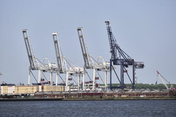 Container cranes sit idle at the port of the port of New York & New Jersey in Bayonne, N.J., Monday, May 12, 2025. (AP Photo/Matt Rourke)
