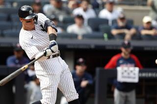 New York Yankees right fielder Aaron Judge (99) hits a home run against the Minnesota Twins during the sixth inning of a baseball game Monday, Sept. 5, 2022, in New York. (AP Photo/Noah K. Murray)