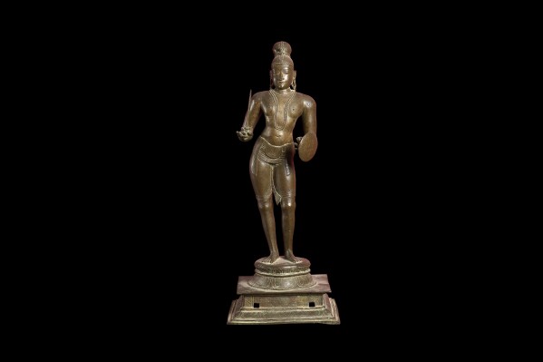 In this photo provided by Ashmolean Museum, University of Oxford on Monday, June 10, 2024, a view of a 500-year-old bronze depicting Tirumankai Alvar. Oxford University has agreed to return a 500-year-old bronze sculpture of a Hindu saint to India. The Ashmolean Museum says the Indian High Commission had made a claim four years ago for the bronze figure of Tirumankai Alvar that was allegedly looted from a temple. (Ashmolean Museum, University of Oxford via AP)