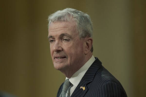 FILE - New Jersey Gov. Phil Murphy delivers his budget address to a joint session of the state Legislature at the Statehouse in Trenton, N.J., Feb. 28, 2023. New Jersey recorded the lowest number of shootings in 2023 since record keeping began in 2009, Murphy said Thursday, Jan. 4, 2024. (AP Photo/Matt Rourke, File)