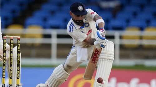 India's Virat Kohli plays a shot from the bowling of West Indies' Jomel Warrican on day one of their second cricket Test match at Queen's Park in Port of Spain, Trinidad and Tobago, Thursday, July 20, 2023. (AP Photo/Ricardo Mazalan)