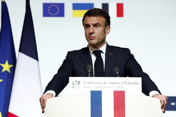 French President Emmanuel Macron speaks during a press conference at the Elysee Palace in Paris, Monday, Feb. 26, 2024. More than 20 European heads of state and government and other Western officials are gathering in a show of unity for Ukraine, signaling to Russia that their support for Kyiv isn't wavering as the full-scale invasion grinds into a third year. (Gonzalo Fuentes/Pool via AP)