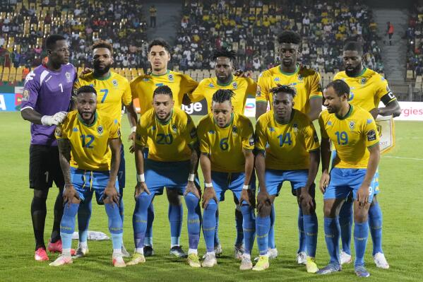 Gabon's players pose for photographers before the start of their African Cup of Nations 2022 group C soccer match against Ghana at the Ahmadou Ahidjo stadium in Yaounde, Cameroon, Friday, Jan. 14, 2022. (AP Photo/Themba Hadebe)