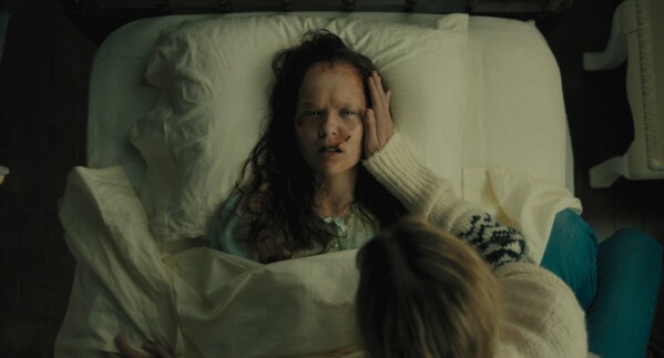 This image released by Universal Pictures shows Olivia O'Neill in a scene from "The Exorcist: Believer." (Universal Pictures via AP)