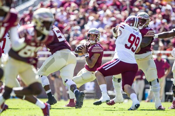 Florida State quarterback McKenzie Milton (10) passes in the first half of an NCAA college football game against Massachusetts in Tallahassee, Fla., Saturday, Oct. 23, 2021. (AP Photo/Mark Wallheiser)