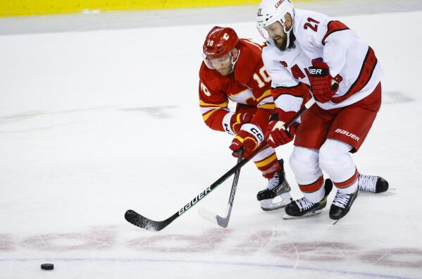 Flames defeat Hurricanes in overtime thriller