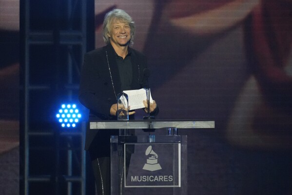 Jon Bon Jovi accepts his Musicares Person of the Year award during a ceremony in his honor on Friday, Feb. 2, 2024, in Los Angeles. (AP Photo/Chris Pizzello)