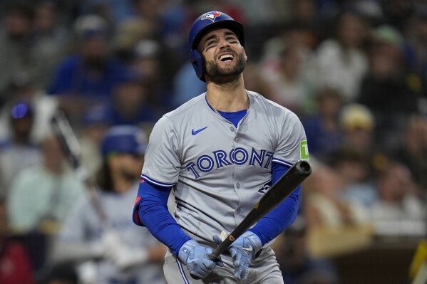 Toronto Blue Jays' Kevin Kiermaier reacts after striking out during the ninth inning of a baseball game against the San Diego Padres, Friday, April 19, 2024, in San Diego. (AP Photo/Gregory Bull)