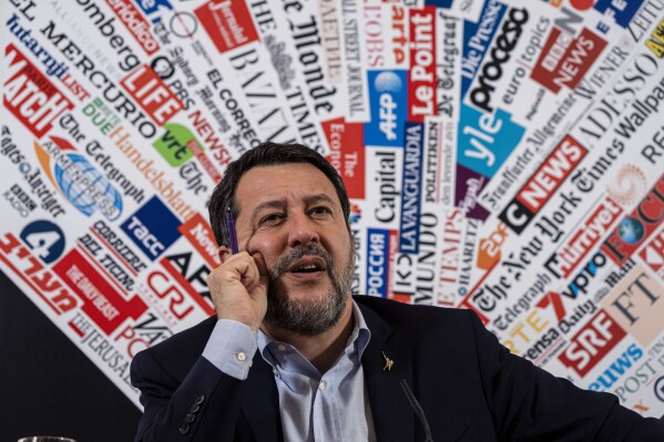 FILE - Italian Infrastructure Minister Matteo Salvini speaks during a press conference at the Foreign Press Club in Rome, Tuesday, April 4, 2023. Italian bank stocks plunged Tuesday, Aug. 8, 2023 after the Cabinet approved a proposal to apply a temporary tax on some bank profits this year to help consumers and businesses cope with higher borrowing costs. Salvini announced the tax at a Monday evening press conference, saying it was a measure of “social equity” to make up for a series of interest rate hikes from the European Central Bank. (AP Photo/Domenico Stinellis, File)