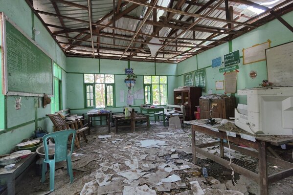 A classroom is seen filled with debris after it was allegedly hit by an airstrike by the military in Ohe Htein Twin village in Tabayin township, also known as Depayin in Sagaing region, Myanmar, May 12, 2025. (Shwebo District Battalion No.12 via AP)