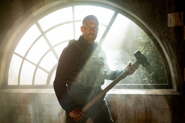 This image released by Amazon MGM Studios shows Jason Statham in a scene from "A Working Man." (Dan Smith/Amazon MGM Studios via AP)