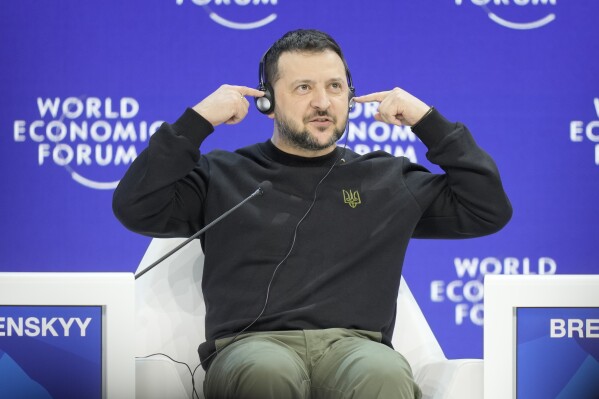Ukrainian President Volodymyr Zelenskyy gestures after his speech at the Annual Meeting of World Economic Forum in Davos, Switzerland, Tuesday, Jan. 16, 2024. The annual meeting of the World Economic Forum is taking place in Davos from Jan. 15 until Jan. 19, 2024.(AP Photo/Markus Schreiber)