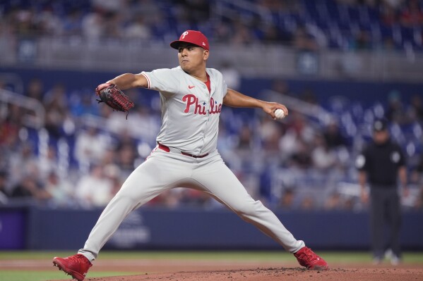 Philadelphia Phillies' Ranger Suarez delivers a pitch during the first inning of a baseball game against the Miami Marlins, Friday, May 10, 2024, in Miami. (AP Photo/Wilfredo Lee)