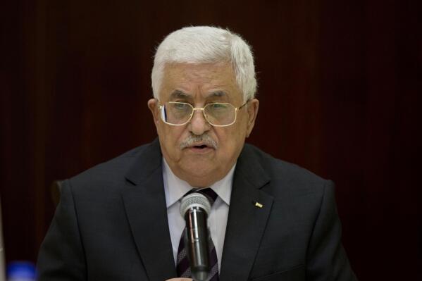 FILE - Palestinian President Mahmoud Abbas chairs the Palestine Liberation Organization (PLO) Executive Committee meeting at the Palestinian Authority headquarters, in the West Bank city of Ramallah, Wednesday, Nov. 4, 2015. Palestinian President Abbas and Israeli Defense Minister Benny Gantz met Thursday, July 7, 2022, in the occupied West Bank to discuss security coordination ahead of U.S. President Joe Biden's visit to the region next week. (AP Photo/Majdi Mohammed, File)