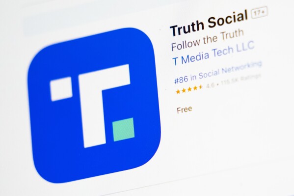 FILE - The download screen for Truth Social app is seen on a laptop computer, March 20, 2024, in New York. Trump Media and Technology Group, the owner of former President Donald Trump's social networking site Truth Social, lost more than $300 million last quarter, according to its first earnings report as a publicly traded company Monday, May 20. (AP Photo/John Minchillo, File)