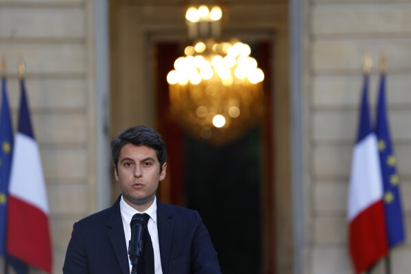 French High Minister Gabriel Attal delivers a speech after the 2nd spherical of the legislative elections, Sunday, July 7, 2024 in Paris. (AP Photo/Aurelien Morissard)