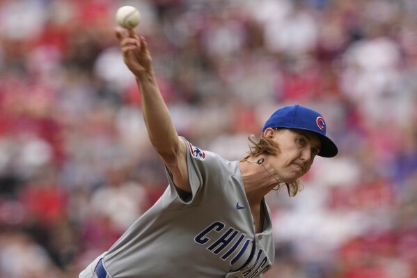 Chicago Cubs pitcher Ben Brown throws in the first inning of a baseball game against the Cincinnati Reds, Sunday, May 25, 2025, in Cincinnati. (AP Photo/Carolyn Kaster)