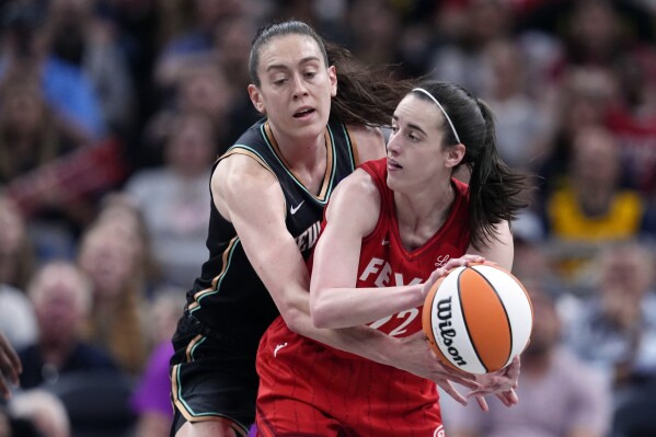 Caitlin Clark rallies Fever past Liberty 83-78 with first triple-double by  WNBA rookie | AP News
