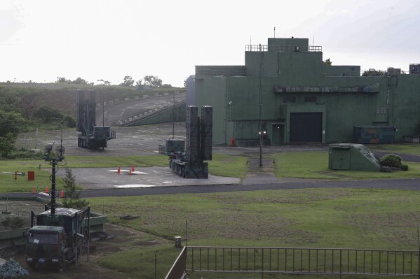 Taiwan's self-made Sky Bow III (Tien-Kung III, TK-3), a long range surface-to-air missile, are prepared for launch from a platform during a drill in Pingtung County, southern Taiwan, Tuesday, Aug. 20, 2024. (AP Photo/Chiang Ying-ying)