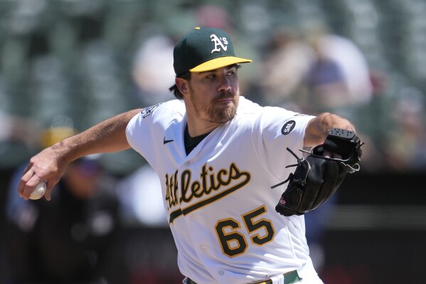 A's beat Rays 2-1 for 7th straight win as fans hold reverse