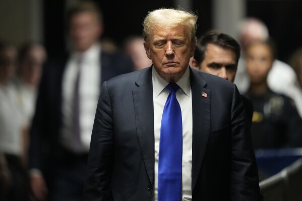 Former President Donald Trump walks to make comments to members of the media after being found guilty on 34 felony counts of falsifying business records in the first degree at Manhattan Criminal Court, Thursday, May 30, 2024, in New York. Donald Trump became the first former president to be convicted of felony crimes as a New York jury found him guilty of 34 felony counts of falsifying business records in a scheme to illegally influence the 2016 election through hush money payments to a porn actor who said the two had sex. (AP Photo/Seth Wenig, Pool)