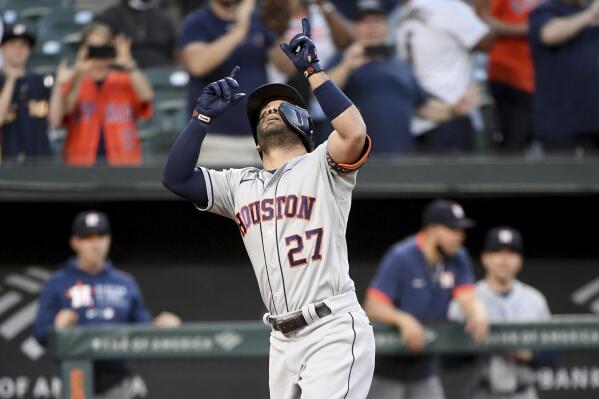 Houston Astros' Jose Altuve celebrates after hitting a two-run home run against the Baltimore Orioles in the fourth inning of a baseball game, Wednesday, June 23, 2021, in Baltimore. (AP Photo/Will Newton)