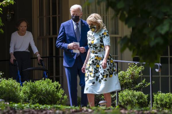 Former first lady Rosalynn Carter looks on as President Joe Biden and first lady Jill Biden leave the home of former President Jimmy Carter during a trip to mark Biden’s 100th day in office, Thursday, April 29, 2021, in Plains, Ga. (AP Photo/Evan Vucci)