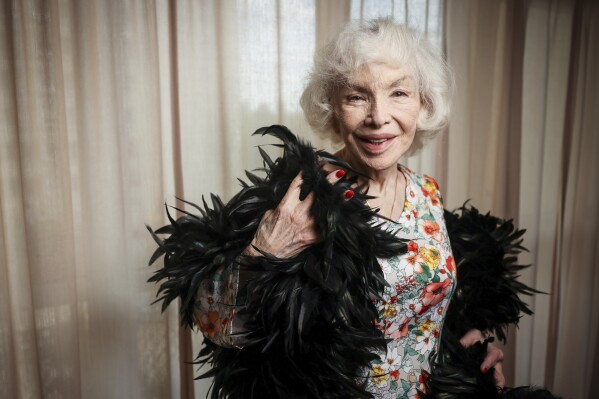 Bambi and her black boa, a whisper from her glamorous past. (AP Photo/Thomas Padilla)