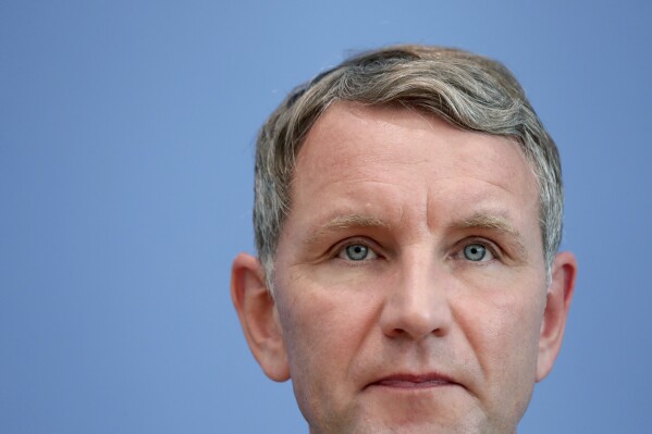 FILE - Bjoern Hoecke attends a press conference in Berlin, Germany, Monday, Oct. 28, 2019 one day after the state elections in the German state of Thuringia. One of the most prominent figures in the far-right Alternative for Germany party is going on trial Thursday on charges of twice using a Nazi slogan, months before a regional election in which he is running to become his state’s governor. Bjoern Hoecke is the leader of the regional branch of Alternative for Germany, or AfD, in the eastern state of Thuringia. (AP Photo/Michael Sohn, File)