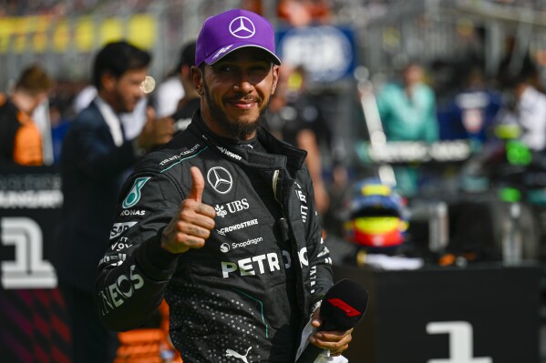 Mercedes driver Lewis Hamilton of Britain celebrates his third place at the Hungarian Formula One Grand Prix race at the Hungaroring racetrack in Mogyorod, Hungary, Sunday, July 21, 2024. (ĢӰԺ Photo/Denes Erdos)