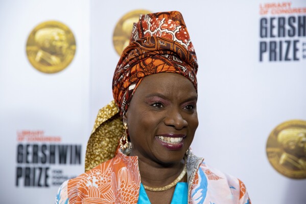 FILE - Angelique Kidjo arrives at the presentation of the Gershwin Prize, which honors a musician's lifetime contribution to popular music, hosted at DAR Constitution Hall in Washington on March 1, 2023. With rising performances at the world's biggest stages and record numbers on global music charts and streaming platforms, African acts are charting a new course for music produced on the continent, taking advantage of high-profile international collaborations, a digital boost from the internet and streaming platforms as well as new investment opportunities. (AP Photo/Amanda Andrade-Rhoades, File)