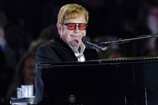FILE - Elton John performs on the South Lawn of the White House in Washington on Sept. 23, 2022. John has achieved EGOT status. The famed British singer-pianist secured an Emmy Award on Monday night, Jan. 15, 2024, for best variety special (live) for “Elton John Live: Farewell from Dodger Stadium,” a three-hour concert documentary that streamed on Disney +. (AP Photo/Susan Walsh, File)