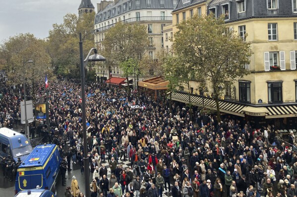 FILE - Thousands gather for a march against antisemitism in Paris, France, on Nov. 12, 2023. Antisemitism is spiking across Europe after Hamas' Oct. 7 massacre and Israel's bombardment of Gaza, worrying Jews from London to Geneva and Berlin. (AP Photo/Sylvie Corbet, File)